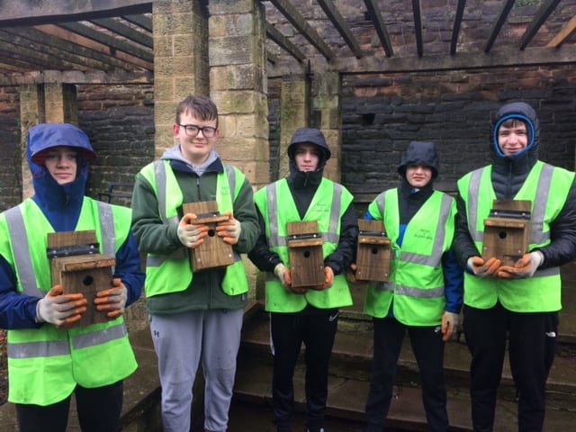Picture of Finn, Cam, Owen, Shea and Alex holding bird boxes